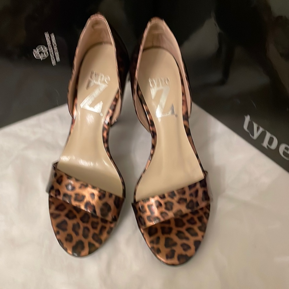Type Z platform animal print with 4 inch black heel.